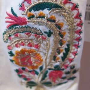 Khaadi pret off white embroidered tights.